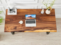 Overhead view of Live Edge Desk walnut top with laptop, mug and vase