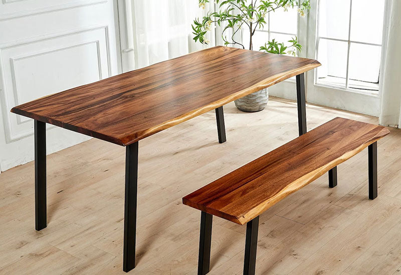 Live Edge Dining Table in walnut with black metal legs, styled with matching bench in a bright dining room