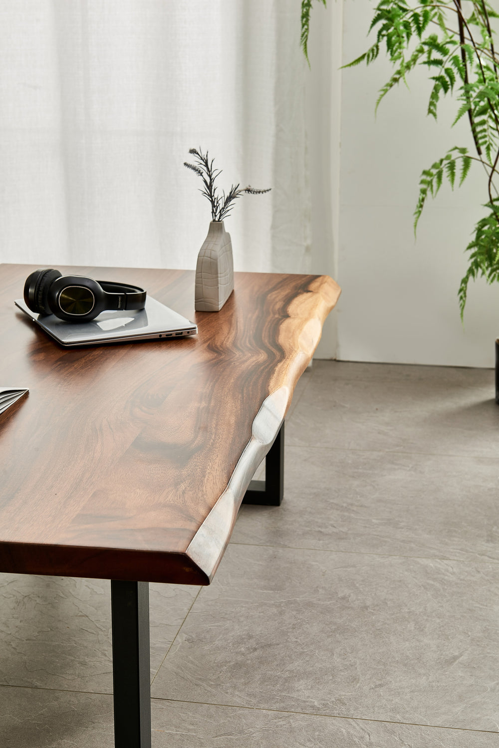 Live Edge Coffee Table live edge top with laptop, headphones and vase