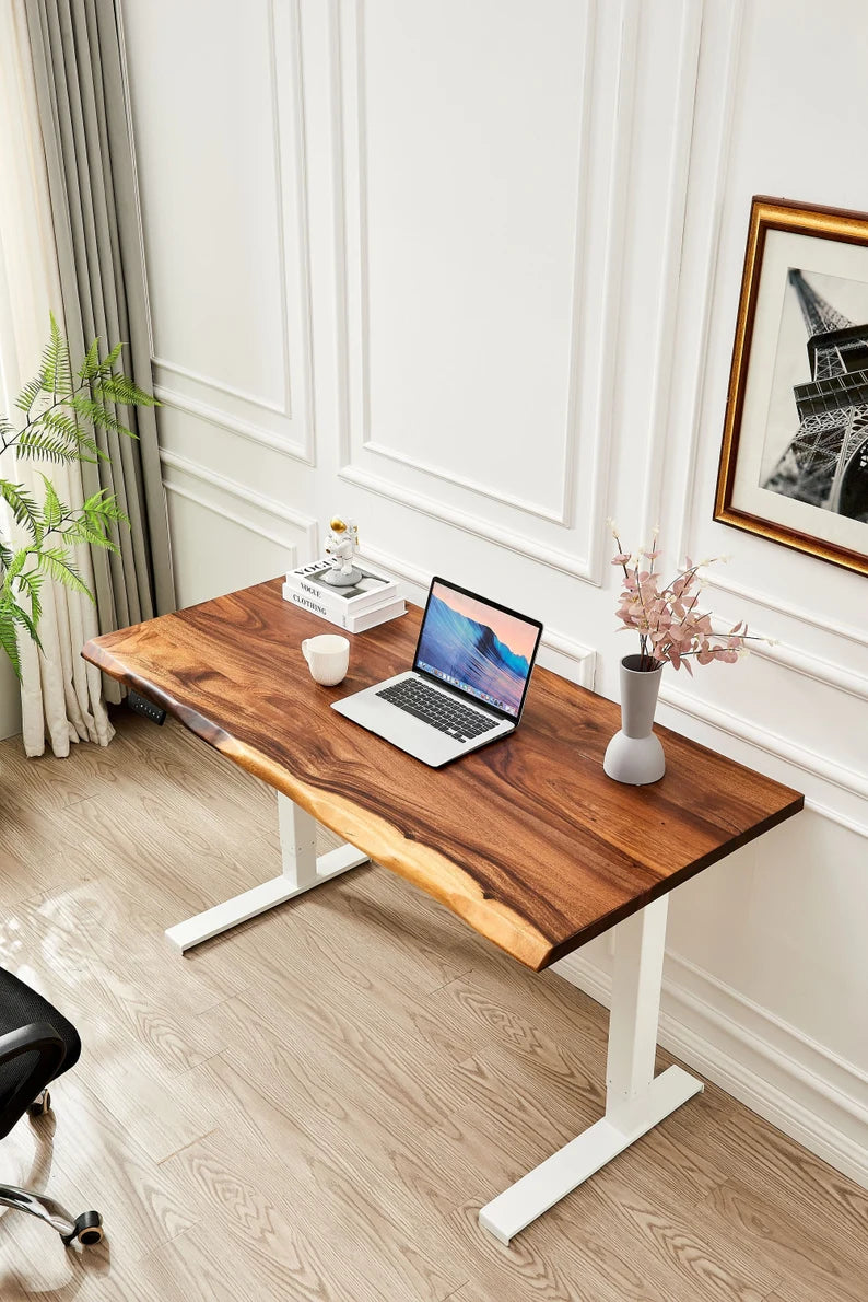 Adjustable Standing Desk in white with walnut live edge top and laptop in a bright office