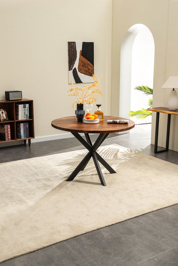 42 inch round walnut top styled in a bright dining room