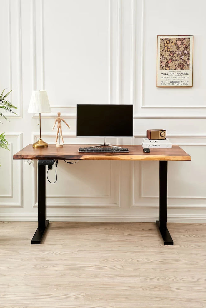 Adjustable Standing Desk in black with walnut top, monitor and keyboard in a home office