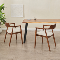 Live edge dining table with two solid wood arm chairs - close angle
