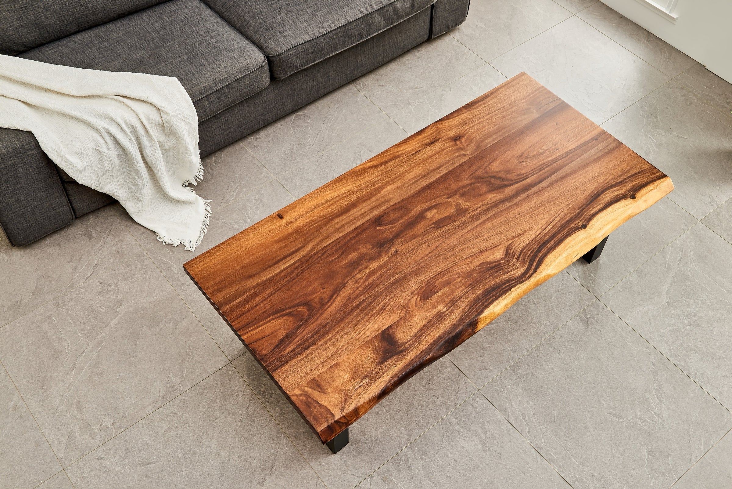 Keelan Scott live edge walnut coffee table in a living room